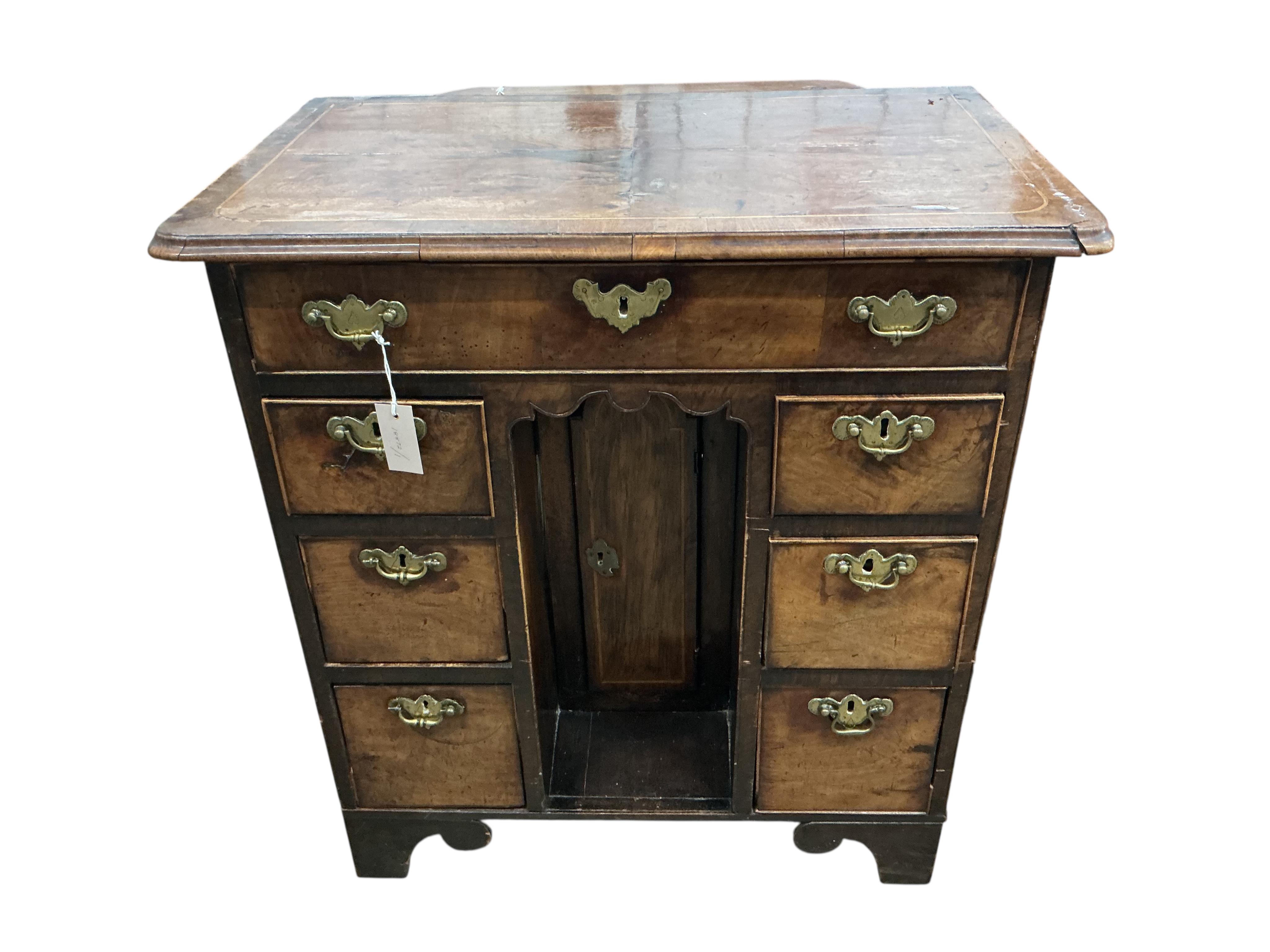 An 18th century walnut kneehole desk, width 79cm, depth 49cm, height 84cm